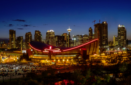 This is a picture of the Saddledome in Calgary at night.